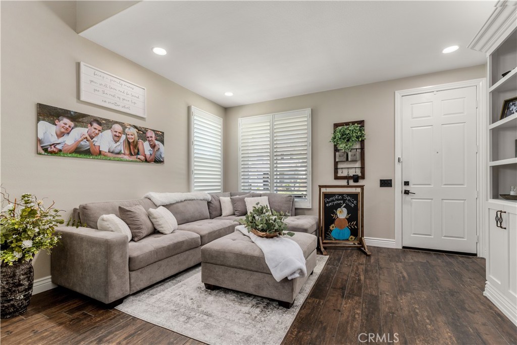 8750 East Heatherwood Road Anaheim Hills, CA 92808 - Photo 4 of 60 a living room with furniture and a large window