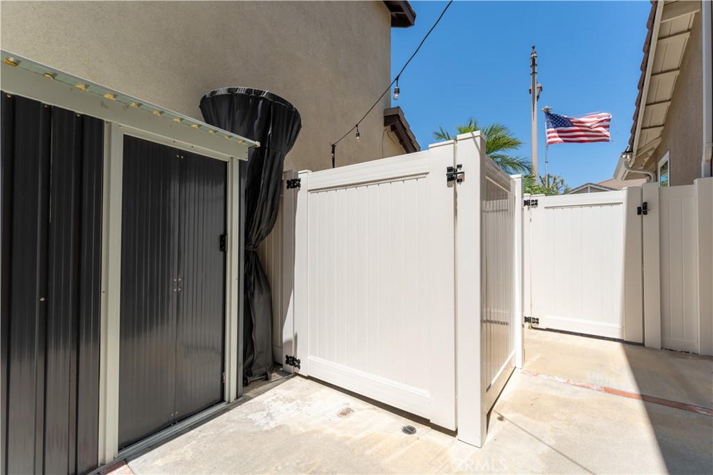 8750 East Heatherwood Road Anaheim Hills, CA 92808 - Photo 42 of 60 a view of a storage & utility room with refrigerator