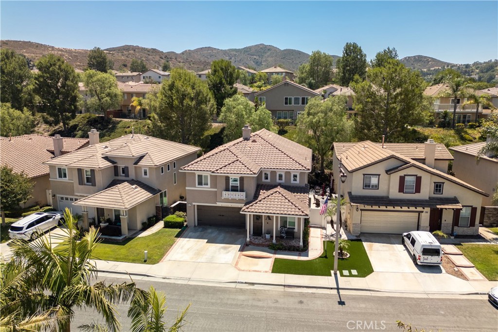 8750 East Heatherwood Road Anaheim Hills, CA 92808 - Photo 49 of 60 an aerial view of a houses with a garden and houses