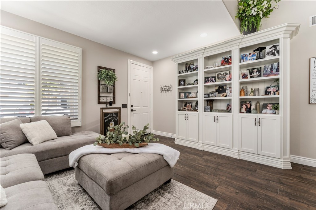 8750 East Heatherwood Road Anaheim Hills, CA 92808 - Photo 5 of 60 a living room with furniture and decor