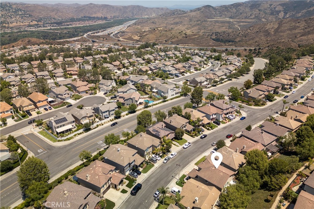 8750 East Heatherwood Road Anaheim Hills, CA 92808 - Photo 51 of 60 an aerial view of residential building with parking space