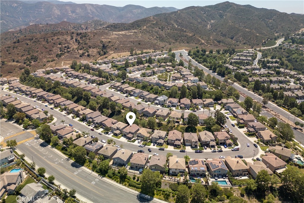 8750 East Heatherwood Road Anaheim Hills, CA 92808 - Photo 55 of 60 an aerial view of residential houses with city view