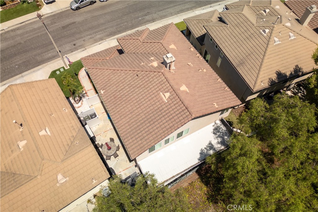8750 East Heatherwood Road Anaheim Hills, CA 92808 - Photo 57 of 60 a view of a backyard with sitting area