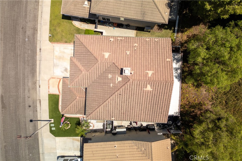 8750 East Heatherwood Road Anaheim Hills, CA 92808 - Photo 58 of 60 a front view of a house with street