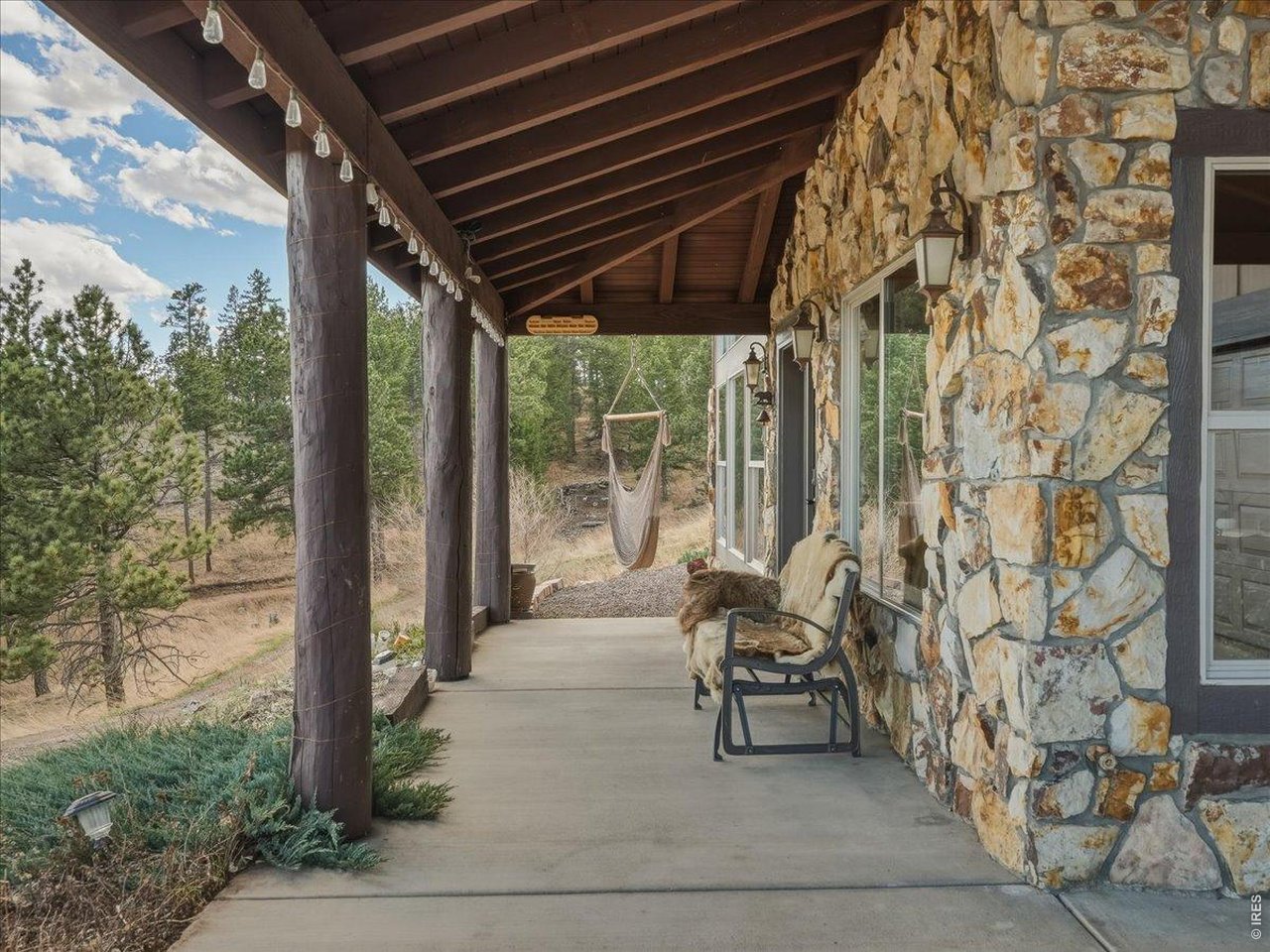 2565 Davis Ranch Road Bellvue, CO 80512 - Photo 2 of 50 Enjoy the Sunrise Over Horsetooth Rock On The Front Patio