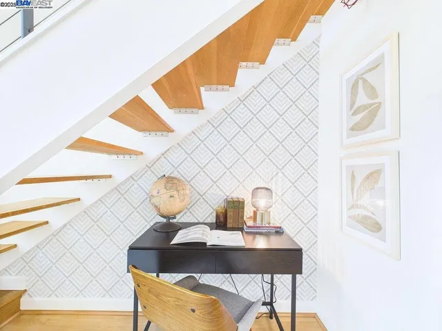 a view of a workspace with furniture
