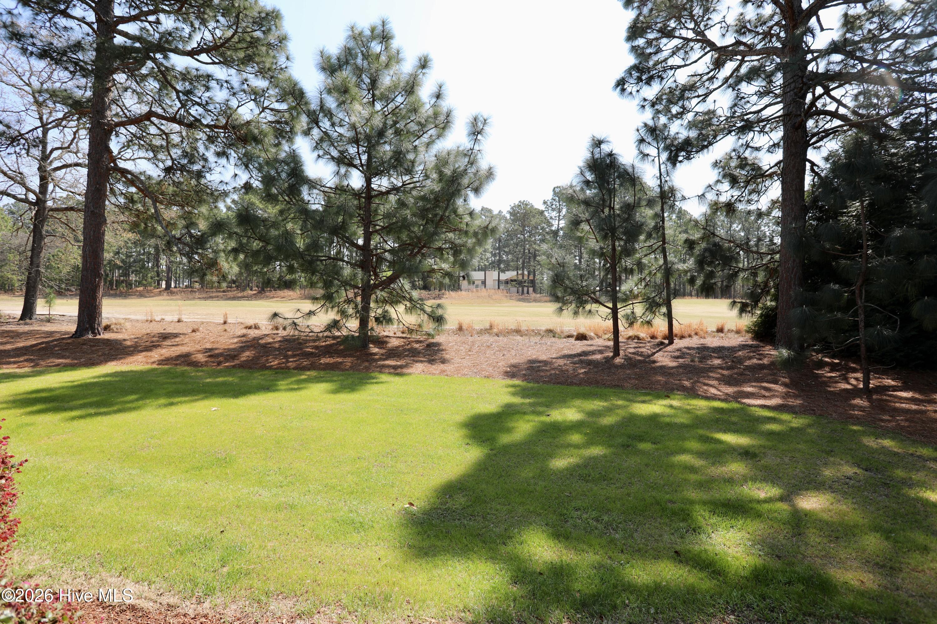 129 Beacon Ridge Drive West End, NC 27376 - Photo 43 of 73 Backyard Views of Golf Course