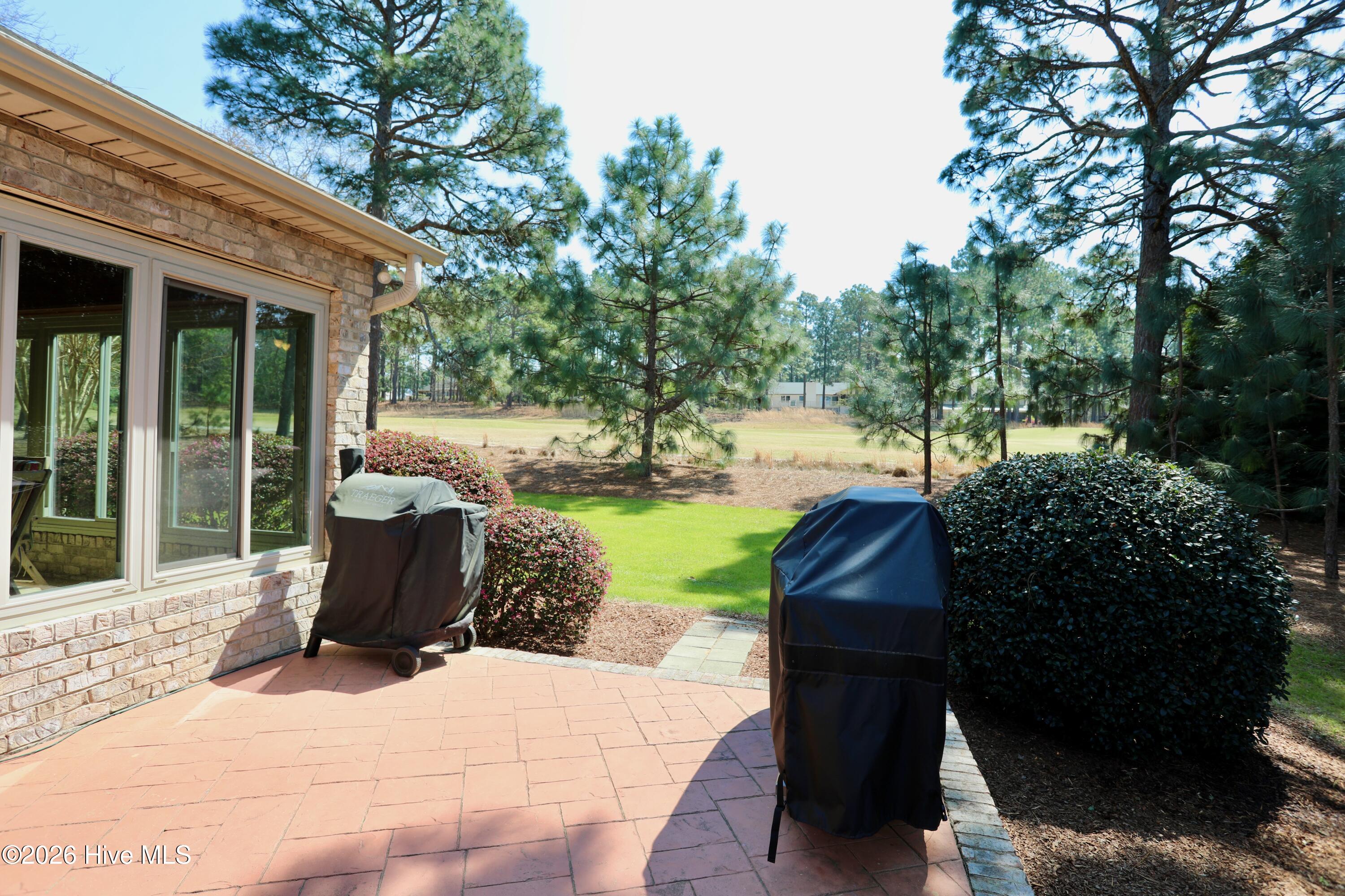 129 Beacon Ridge Drive West End, NC 27376 - Photo 48 of 73 Stamped Concrete Patio