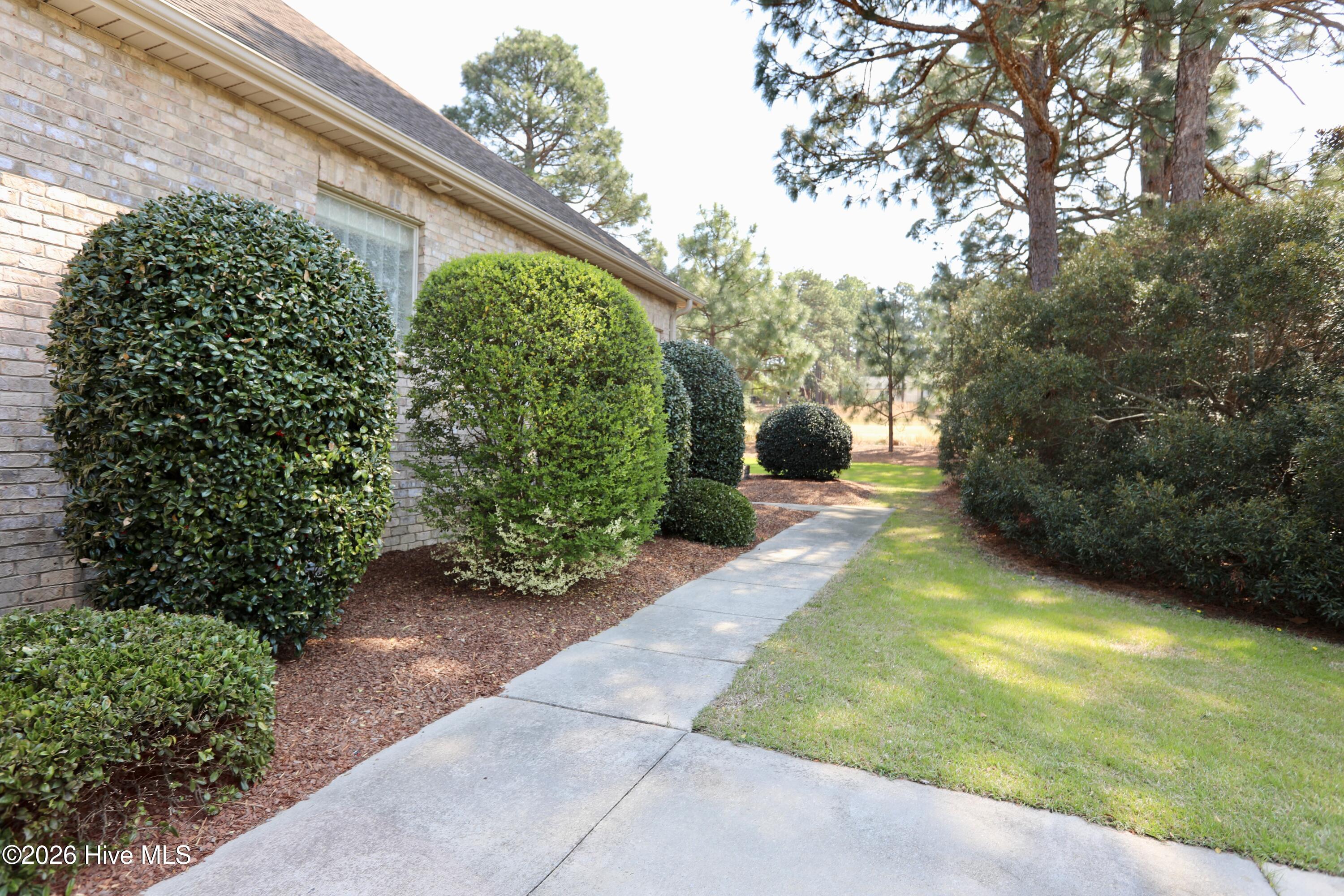 129 Beacon Ridge Drive West End, NC 27376 - Photo 50 of 73 Sidewalk from Garage to Poati