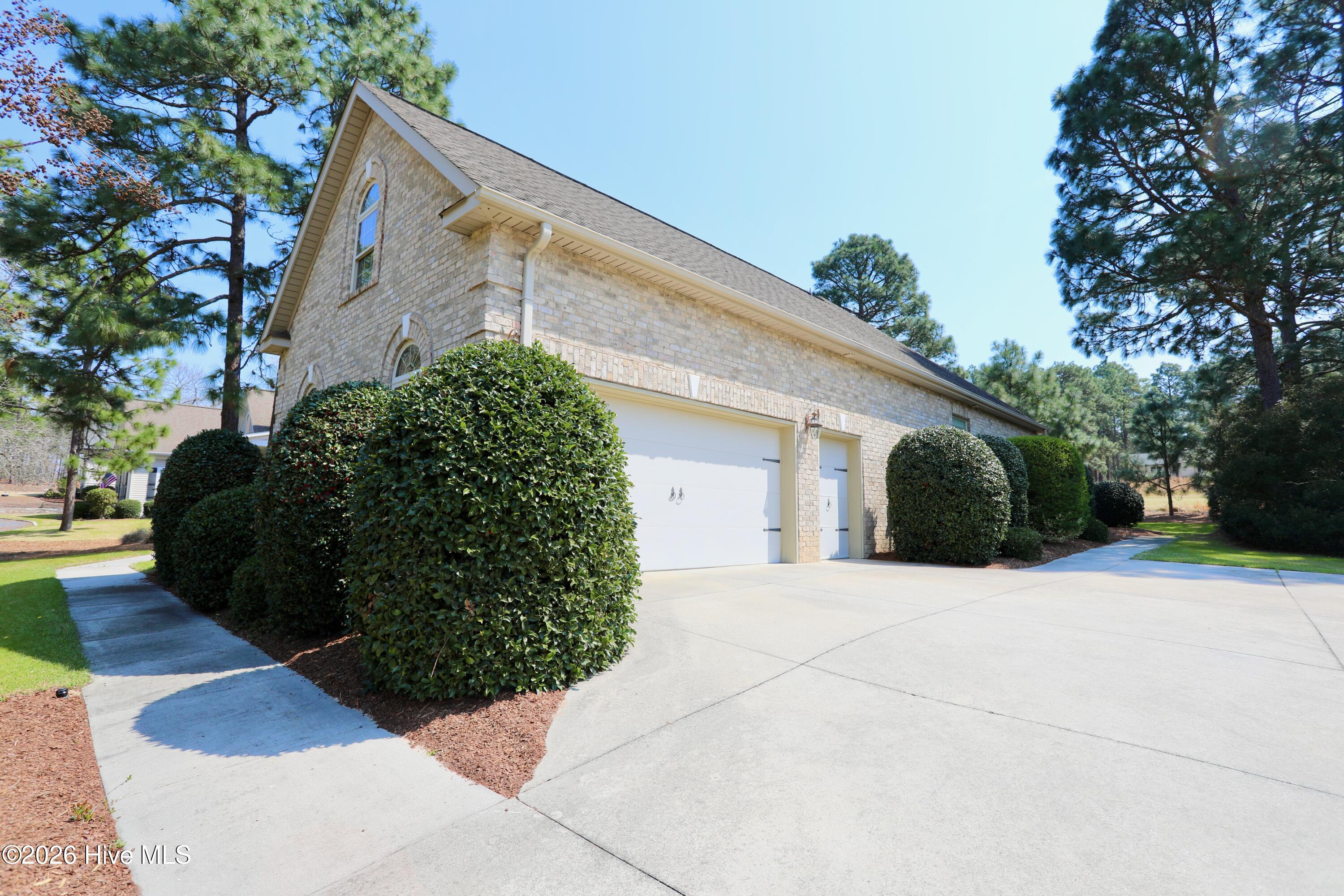 129 Beacon Ridge Drive West End, NC 27376 - Photo 51 of 73 2 Car + Golf Cart Garage