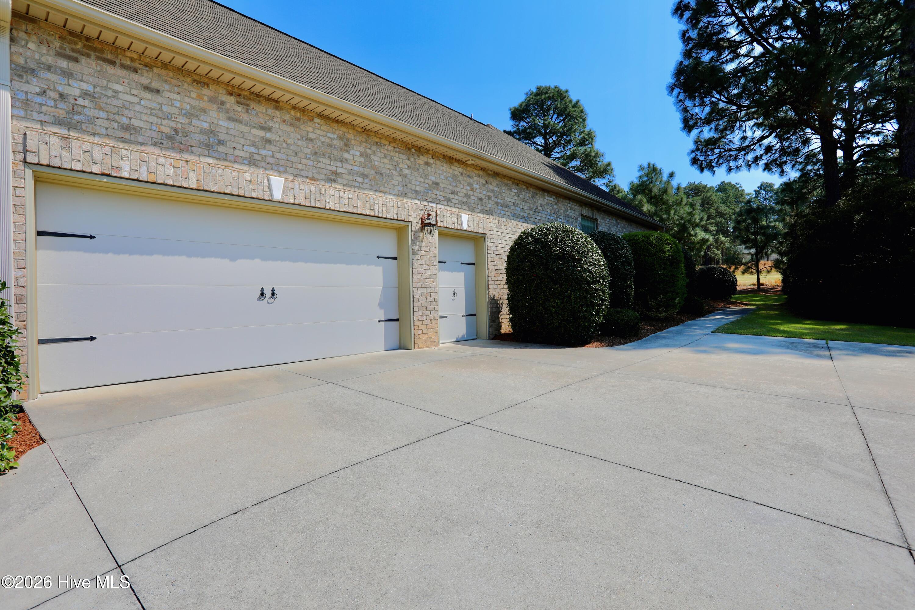 129 Beacon Ridge Drive West End, NC 27376 - Photo 52 of 73 2 Car + Golf Cart Garage