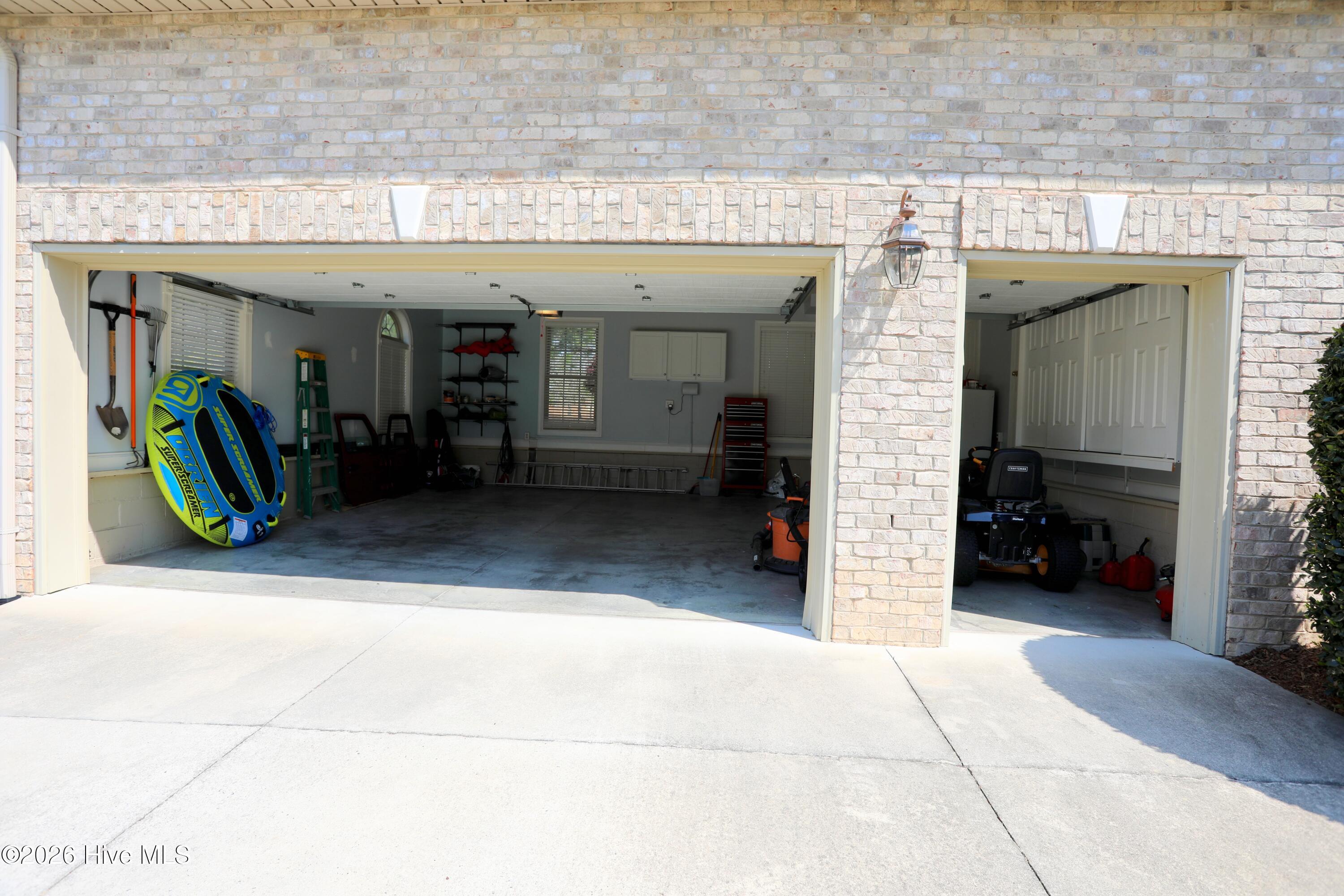 129 Beacon Ridge Drive West End, NC 27376 - Photo 53 of 73 2 Car + Golf Cart Garage