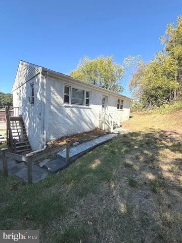 a house view with a garden space