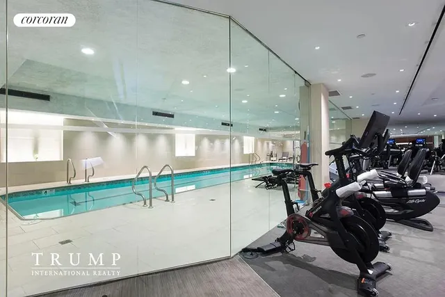 a kitchen with stainless steel appliances granite countertop a sink stove and microwave