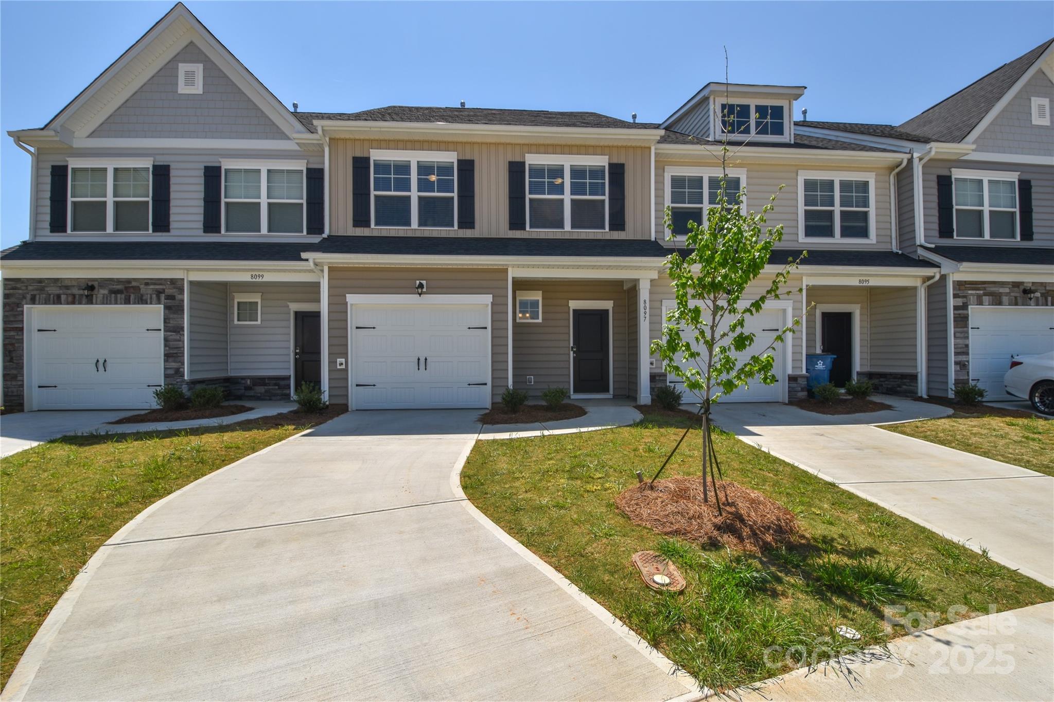 8097 Sheffield Dr. Drive Terrell, NC 28682 - Photo 2 of 26 a front view of a house with yard
