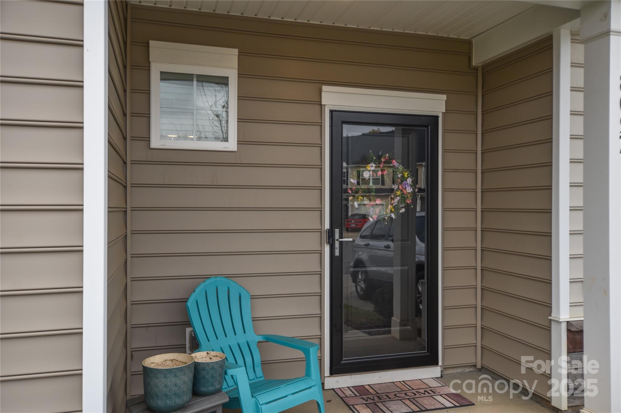 8097 Sheffield Dr. Drive Terrell, NC 28682 - Photo 3 of 26 a front view of a house with table and chairs