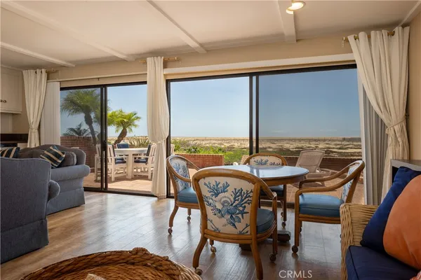 a spacious bedroom with a bed and a couch