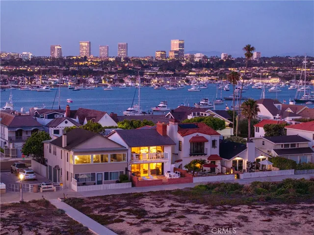a view of living room with furniture and floor to ceiling window
