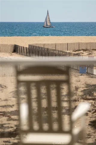 a living room with fireplace furniture and a flat screen tv