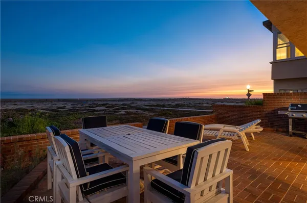 a living room with furniture fireplace and a flat screen tv