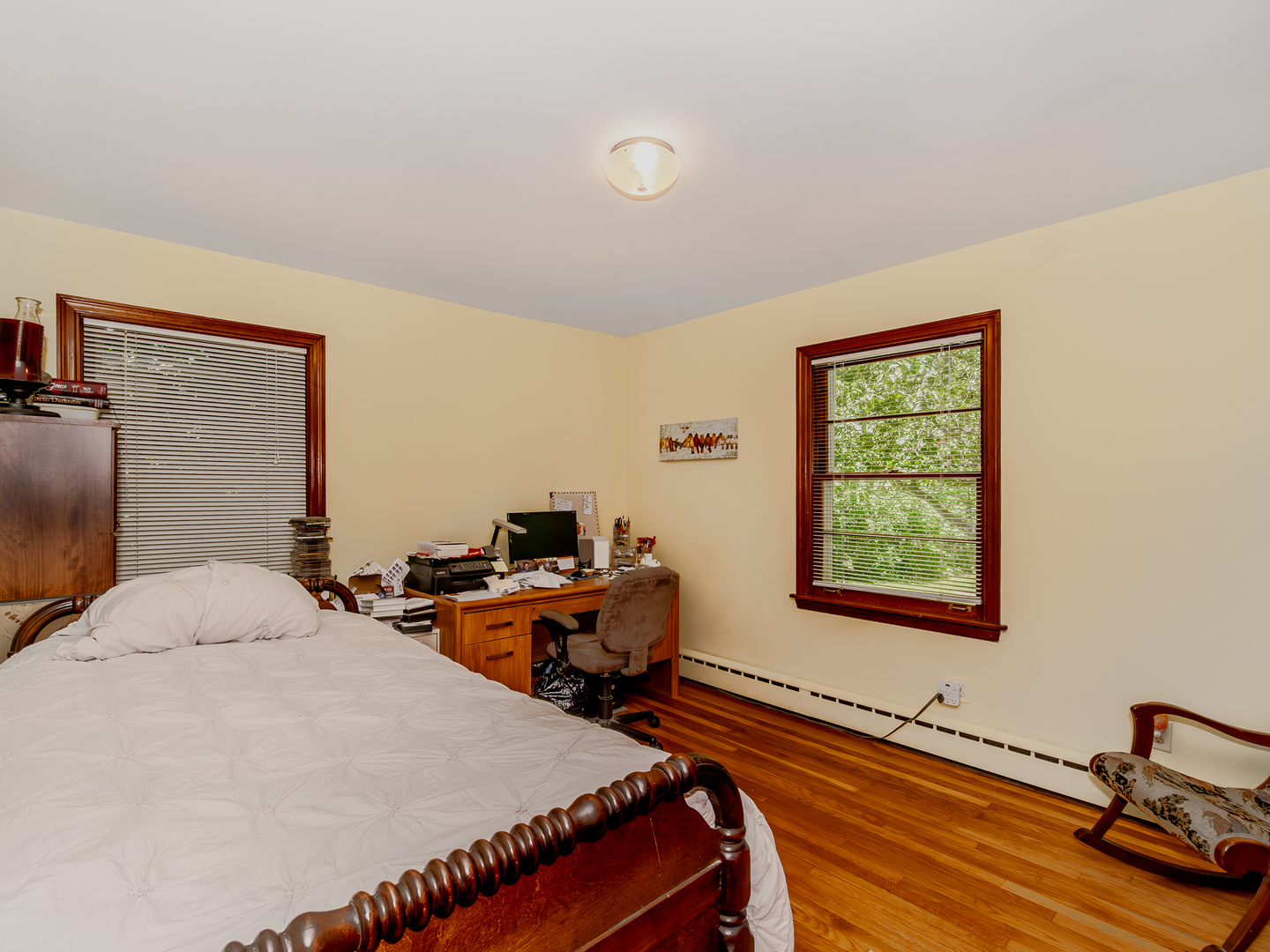 5415 West Pauling Road Monee, IL 60449 - Photo 10 of 17 a bedroom with a bed and a desk next to a window