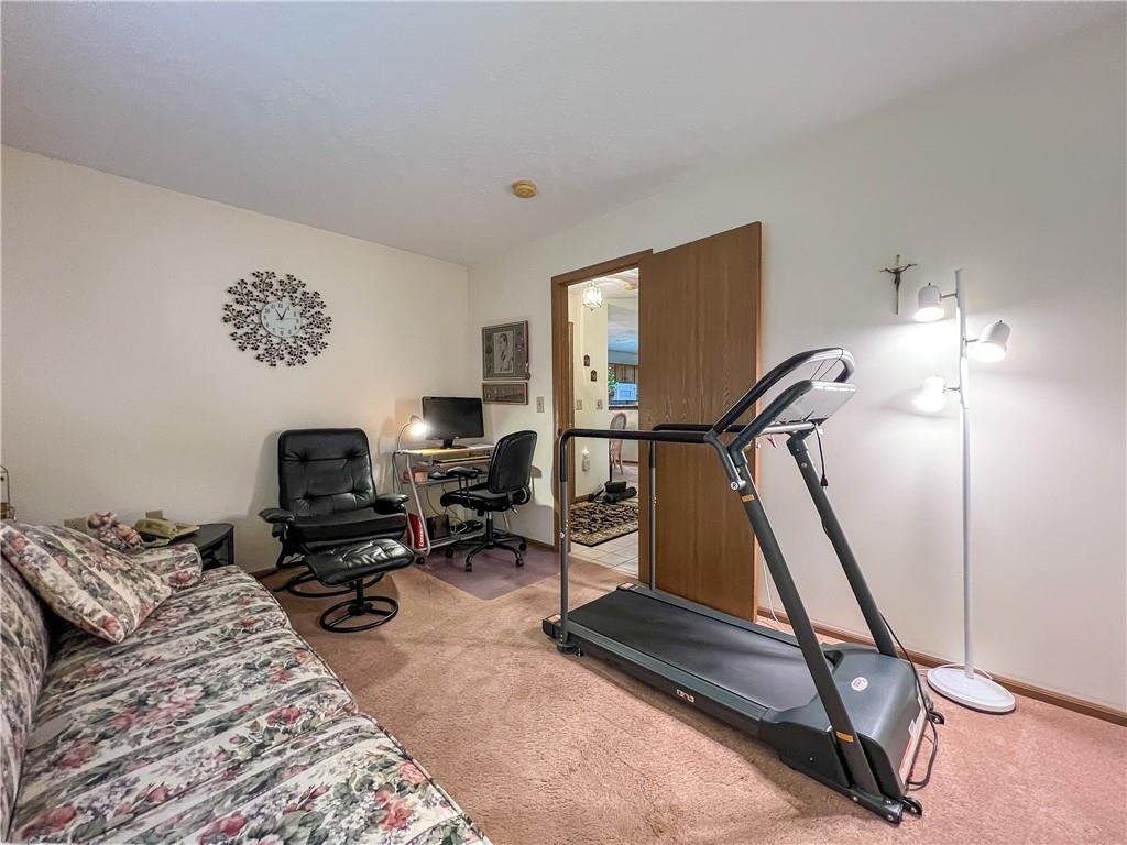 104 Brookstone Court Butler, PA 16001 - Photo 17 of 34 a view of a workspace with furniture and a gym cycle