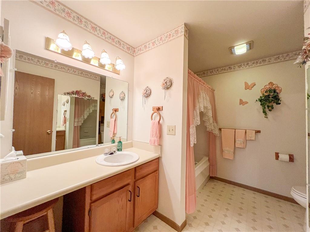 104 Brookstone Court Butler, PA 16001 - Photo 20 of 34 a bathroom with a double vanity sink mirror and shower