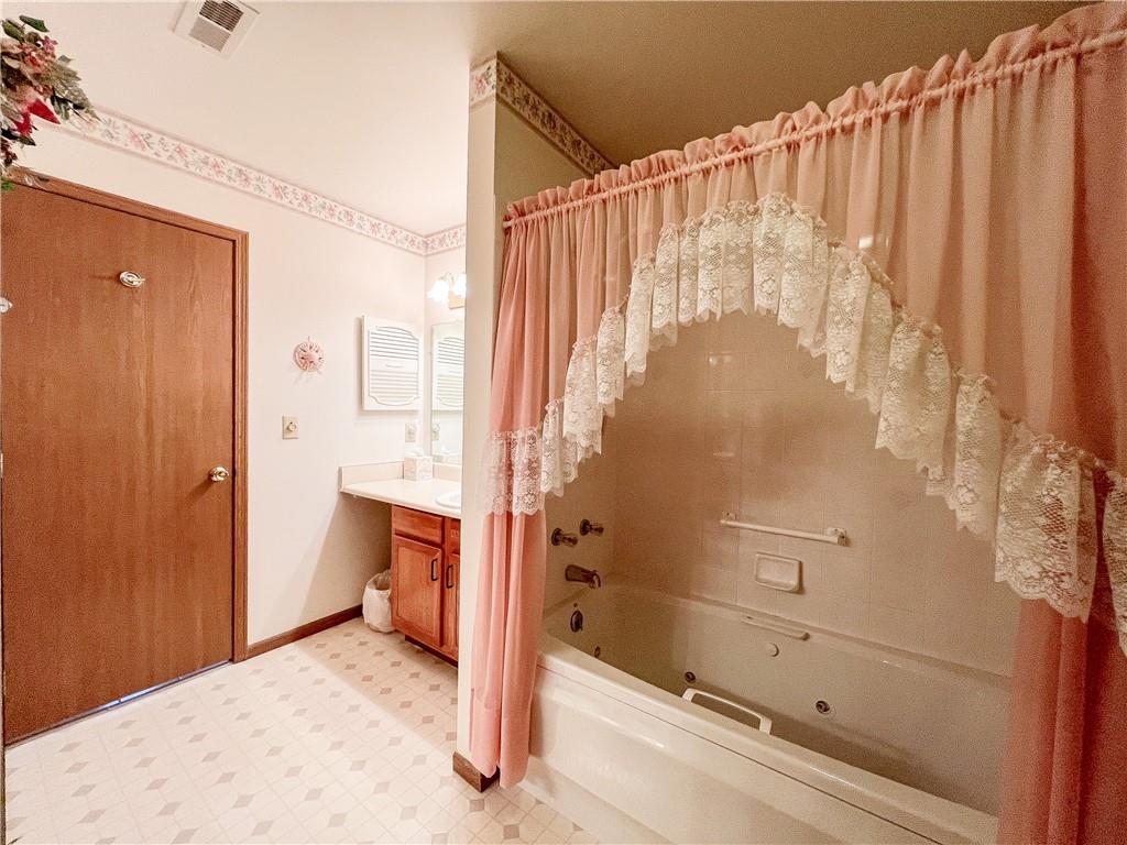 104 Brookstone Court Butler, PA 16001 - Photo 21 of 34 a bathroom with a bathtub and a shower