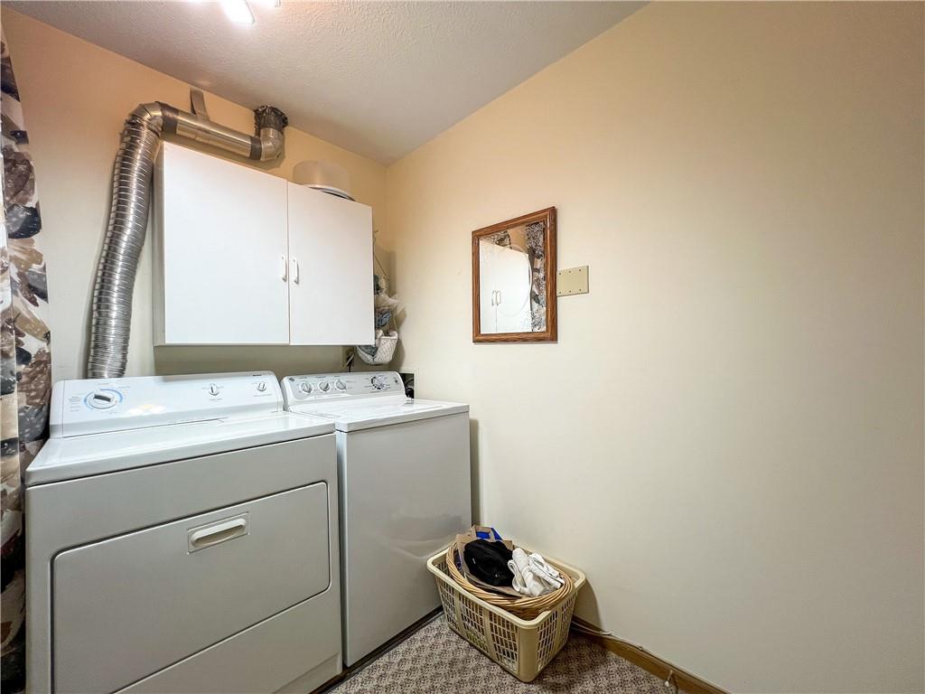 104 Brookstone Court Butler, PA 16001 - Photo 22 of 34 a bathroom with a sink and a mirror