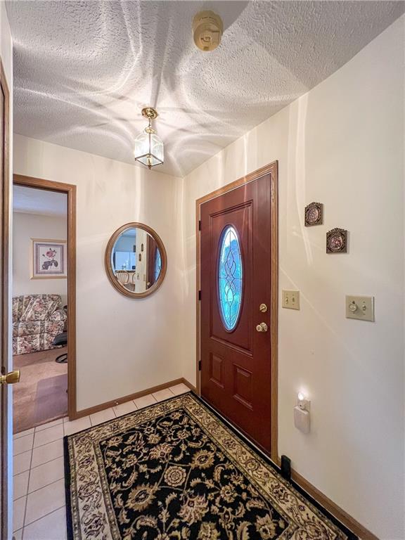 104 Brookstone Court Butler, PA 16001 - Photo 24 of 34 a view of a hallway with wooden floor