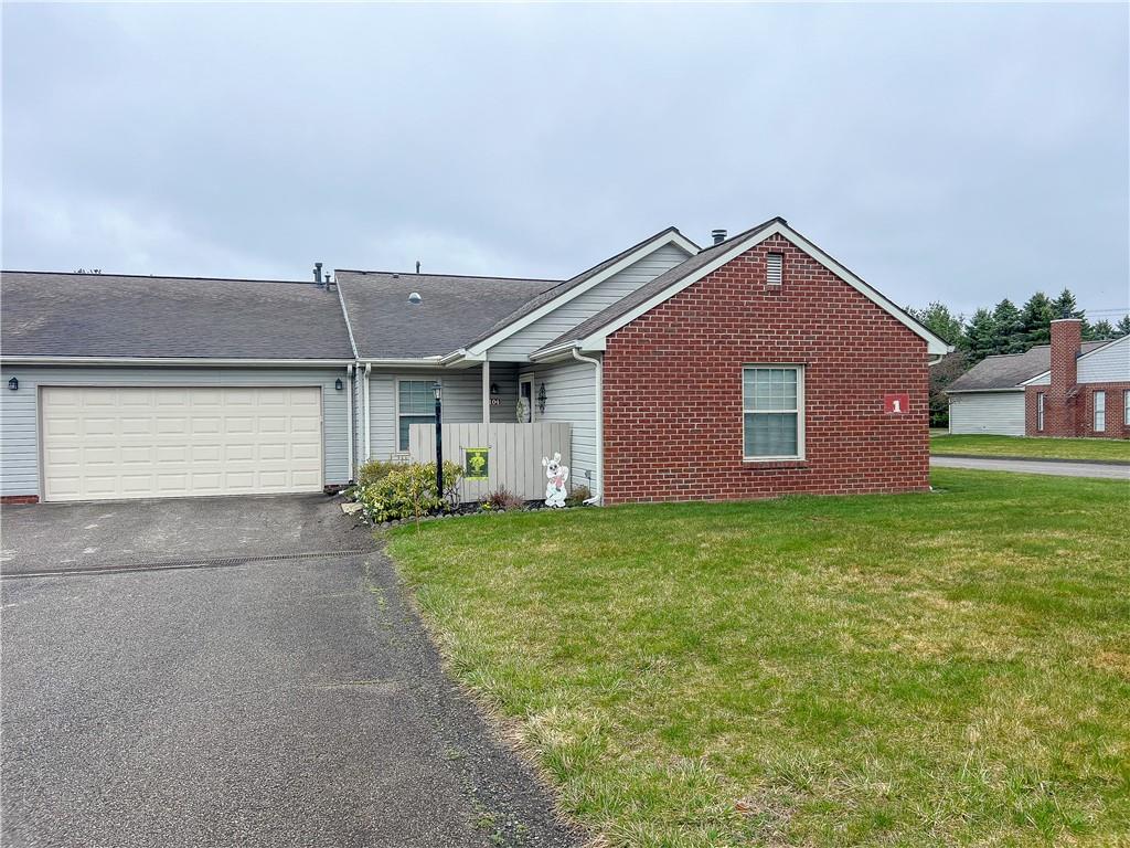 104 Brookstone Court Butler, PA 16001 - Photo 28 of 34 a front view of a house with a garden
