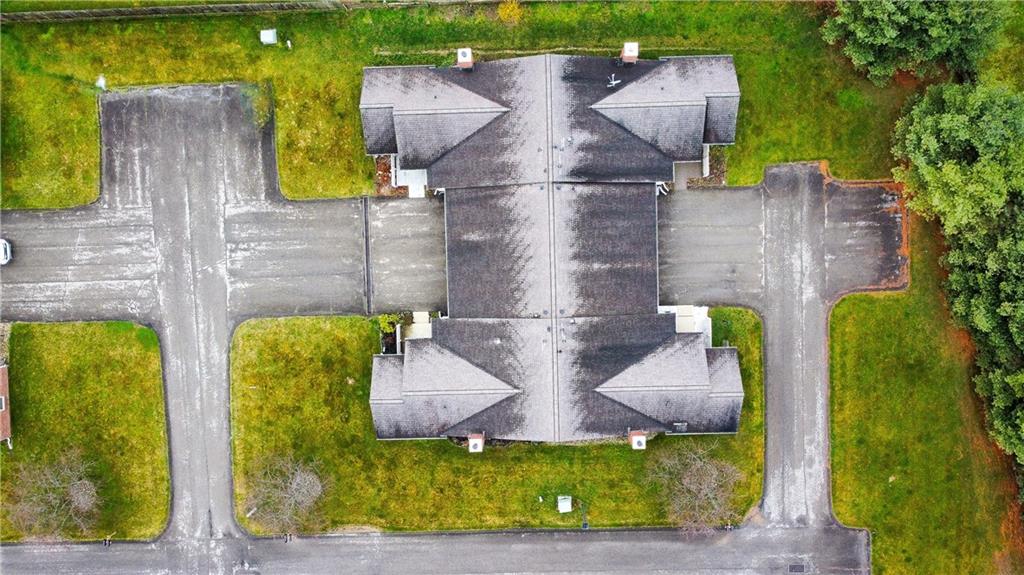 104 Brookstone Court Butler, PA 16001 - Photo 32 of 34 an aerial view of a house with garden space and swimming pool