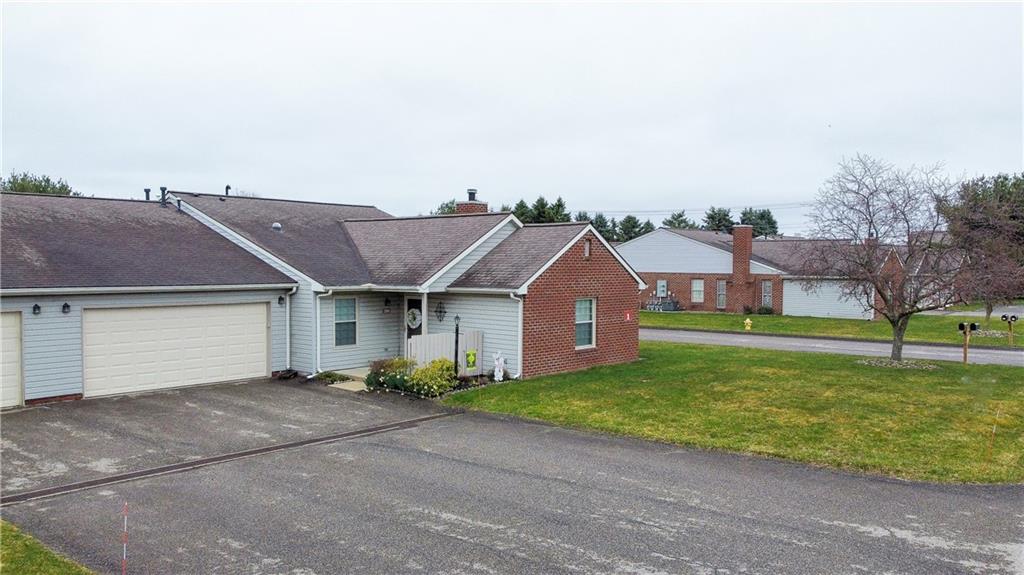 104 Brookstone Court Butler, PA 16001 - Photo 33 of 34 front view of a house with a yard