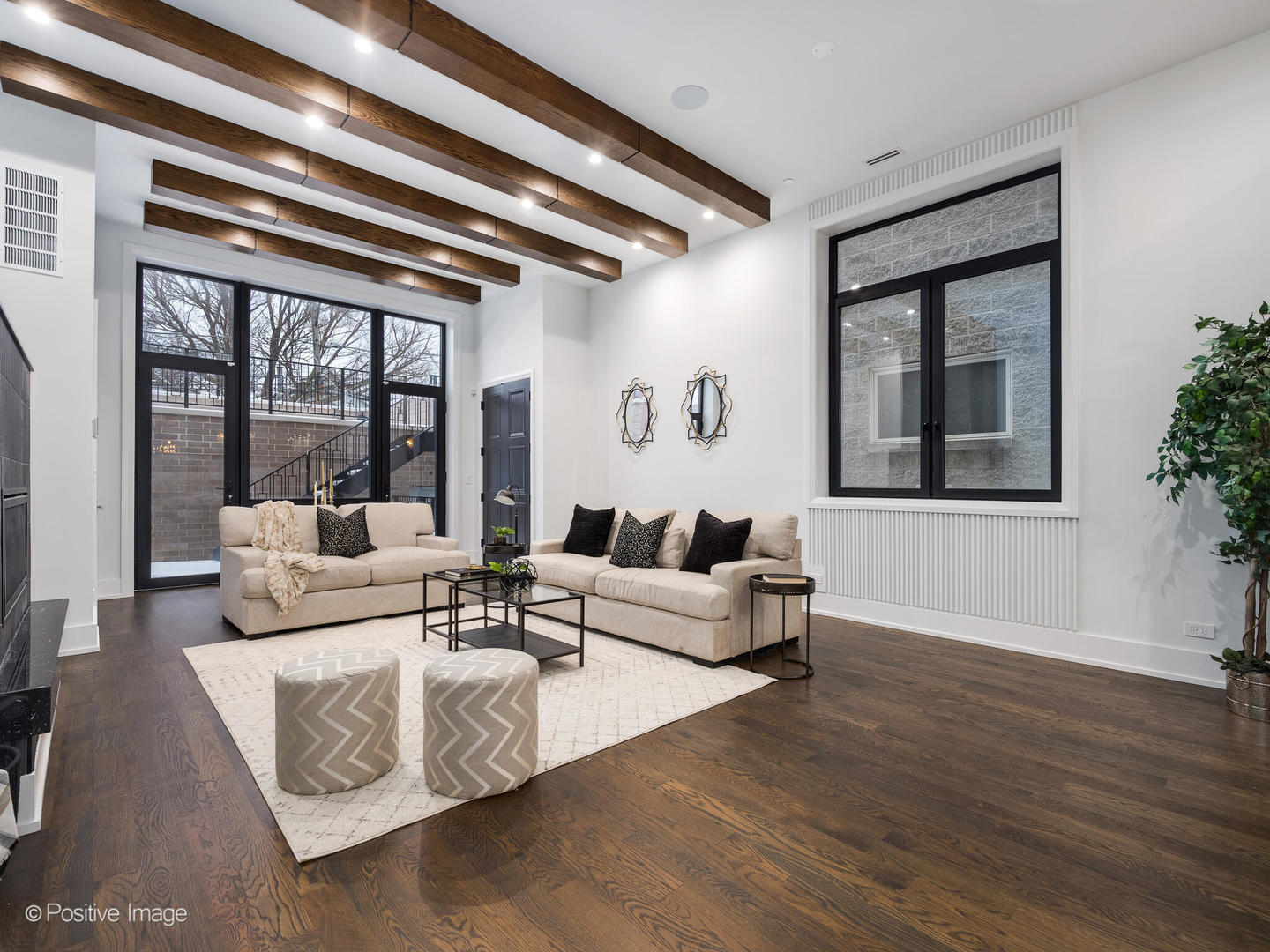 1216 West George Street Chicago, IL 60657 - Photo 11 of 42 a living room with furniture and a large window