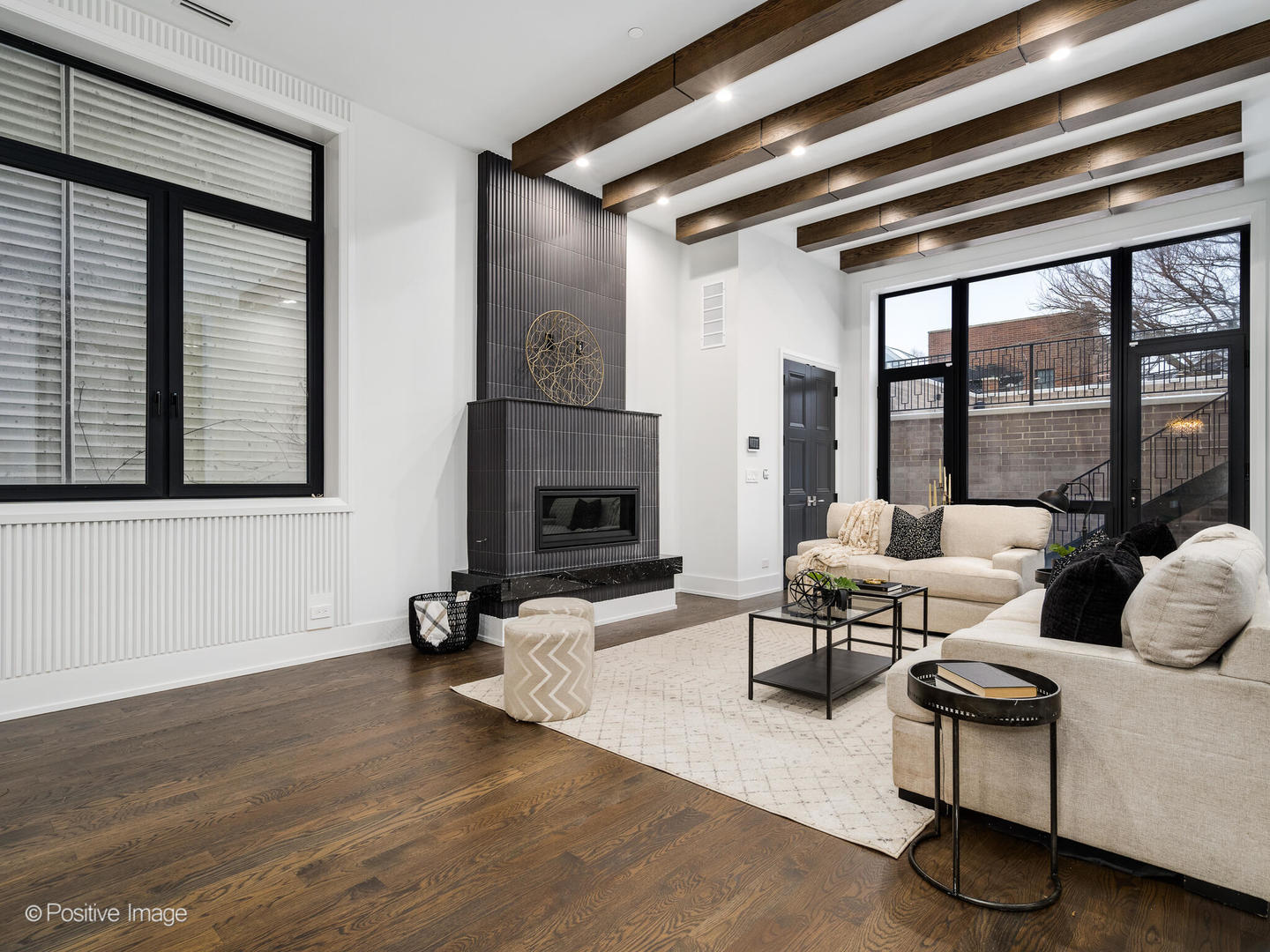 1216 West George Street Chicago, IL 60657 - Photo 12 of 42 a living room with furniture and a fireplace