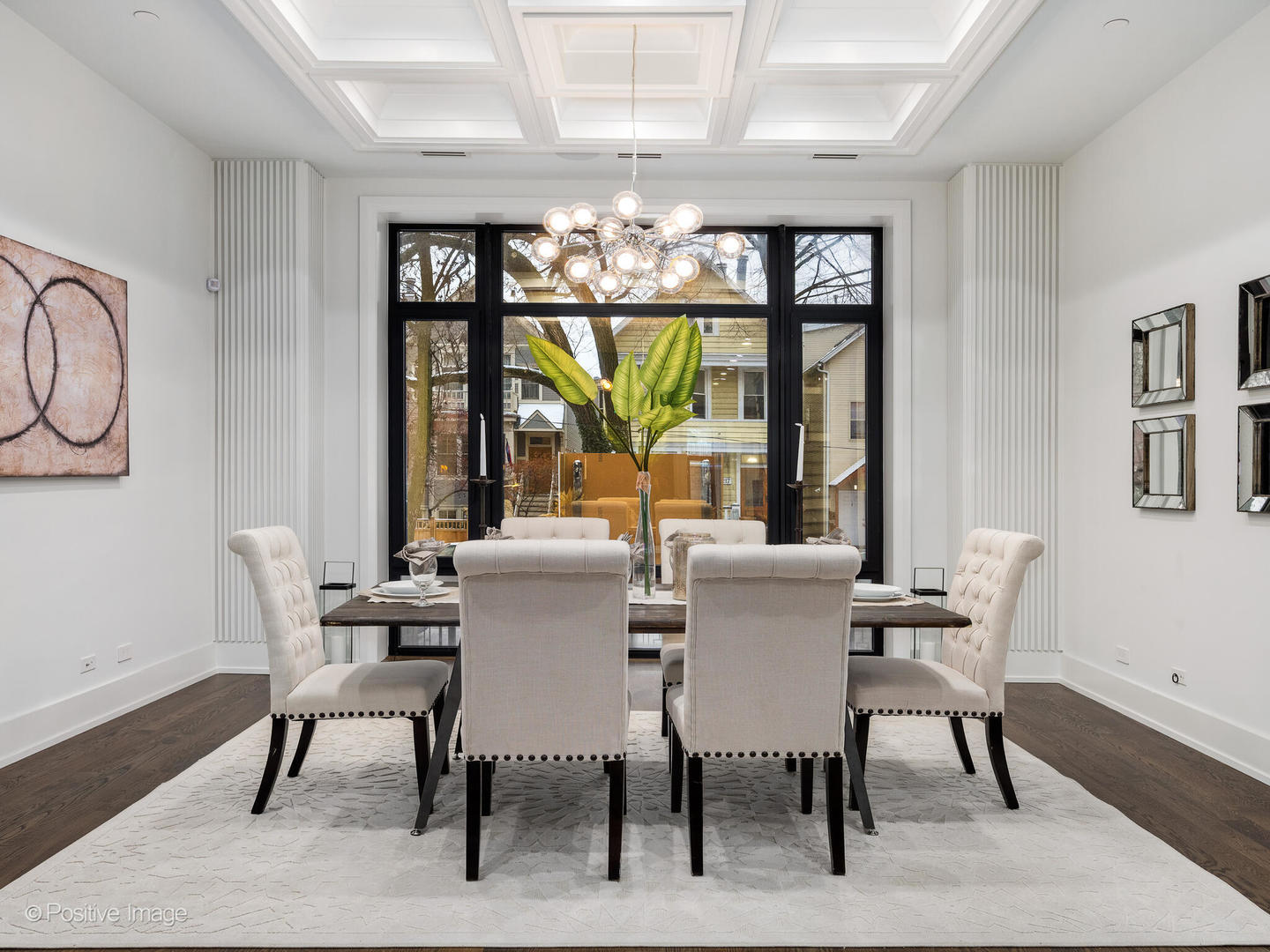 1216 West George Street Chicago, IL 60657 - Photo 4 of 42 a view of a dining room with furniture a chandelier and wooden floor