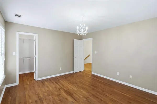 a view of livingroom with hardwood floor and hallway