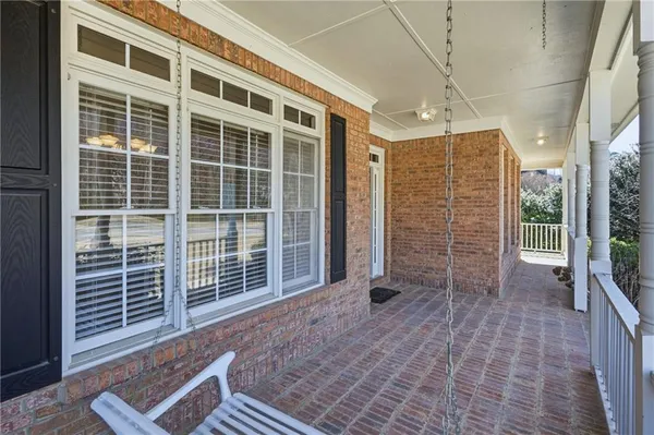 a view of empty room with windows