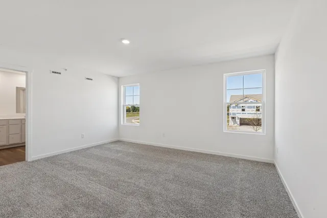 an empty room with windows