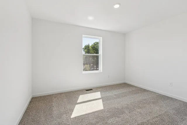 an empty room with a window