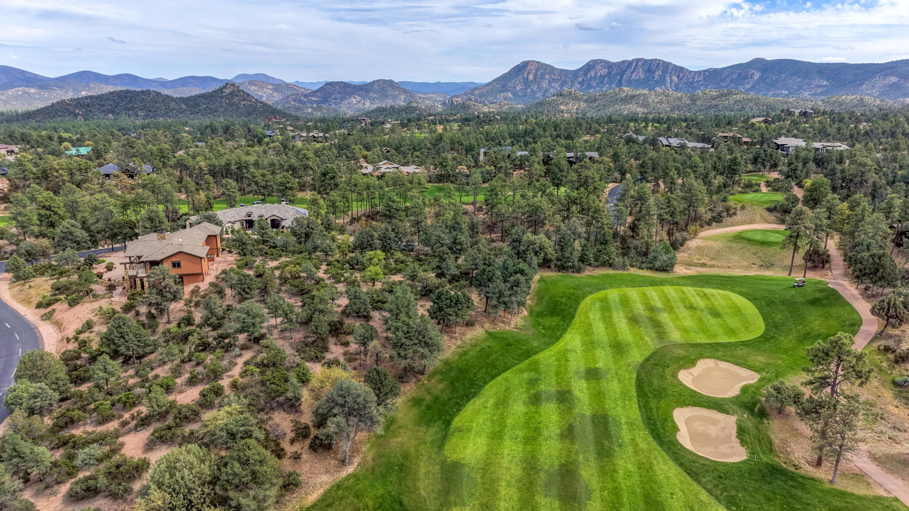 210 South Rim Club Drive Payson, AZ 85541 - Photo 14 of 19 a view of a lush green hillside and a houses