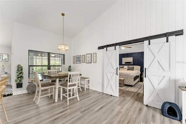 a kitchen with stainless steel appliances granite countertop a refrigerator sink and cabinets