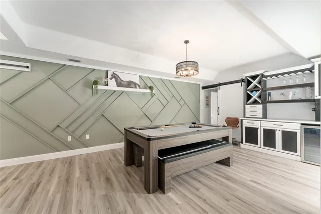 a bathroom with a bathtub and a sink