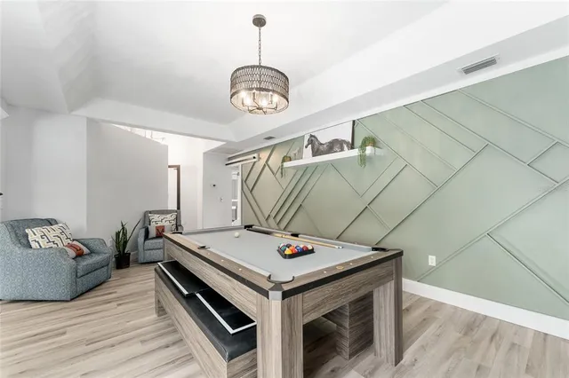 a spacious bathroom with a granite countertop sink mirror and toilet