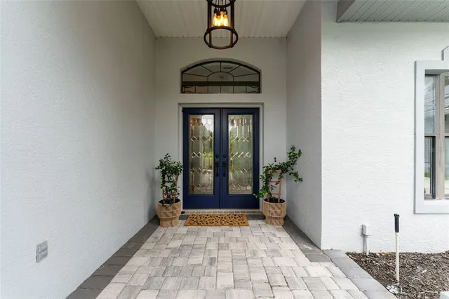 a living room with furniture fireplace and a flat screen tv