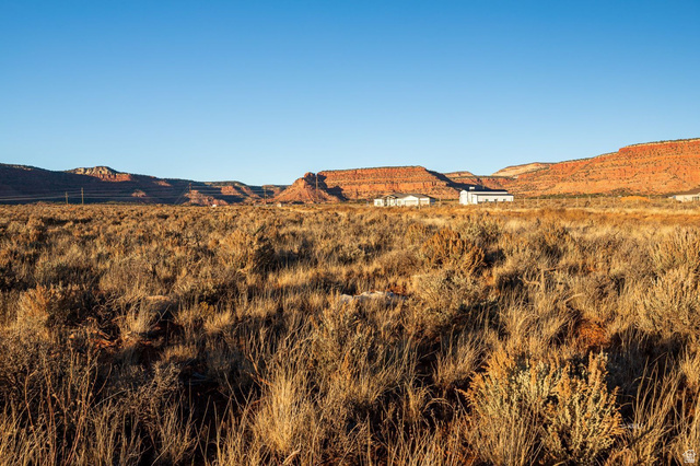 11 Crimson Road East, Unit 11 Kanab, UT 84741 - Photo 15 of 21 View of mountain backdrop featuring rural landscape