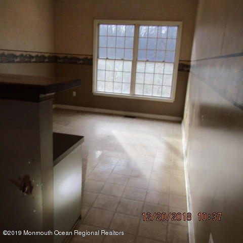 35 Holmes Mill Road Cream Ridge, NJ 08514 - Photo 5 of 7 a view of an empty room and window