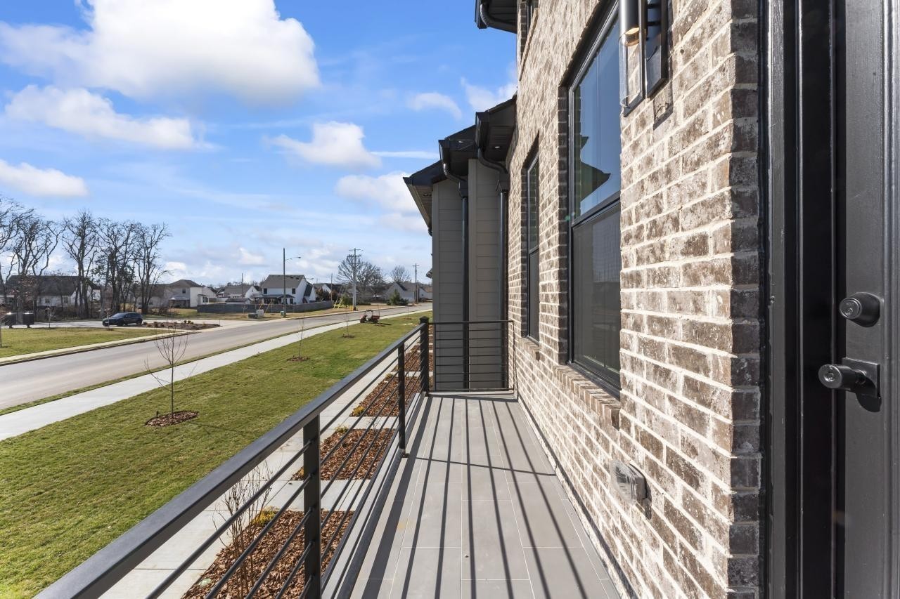 2134 Gracie Bug Loop Murfreesboro, TN 37128 - Photo 4 of 25 a view of balcony with a yard