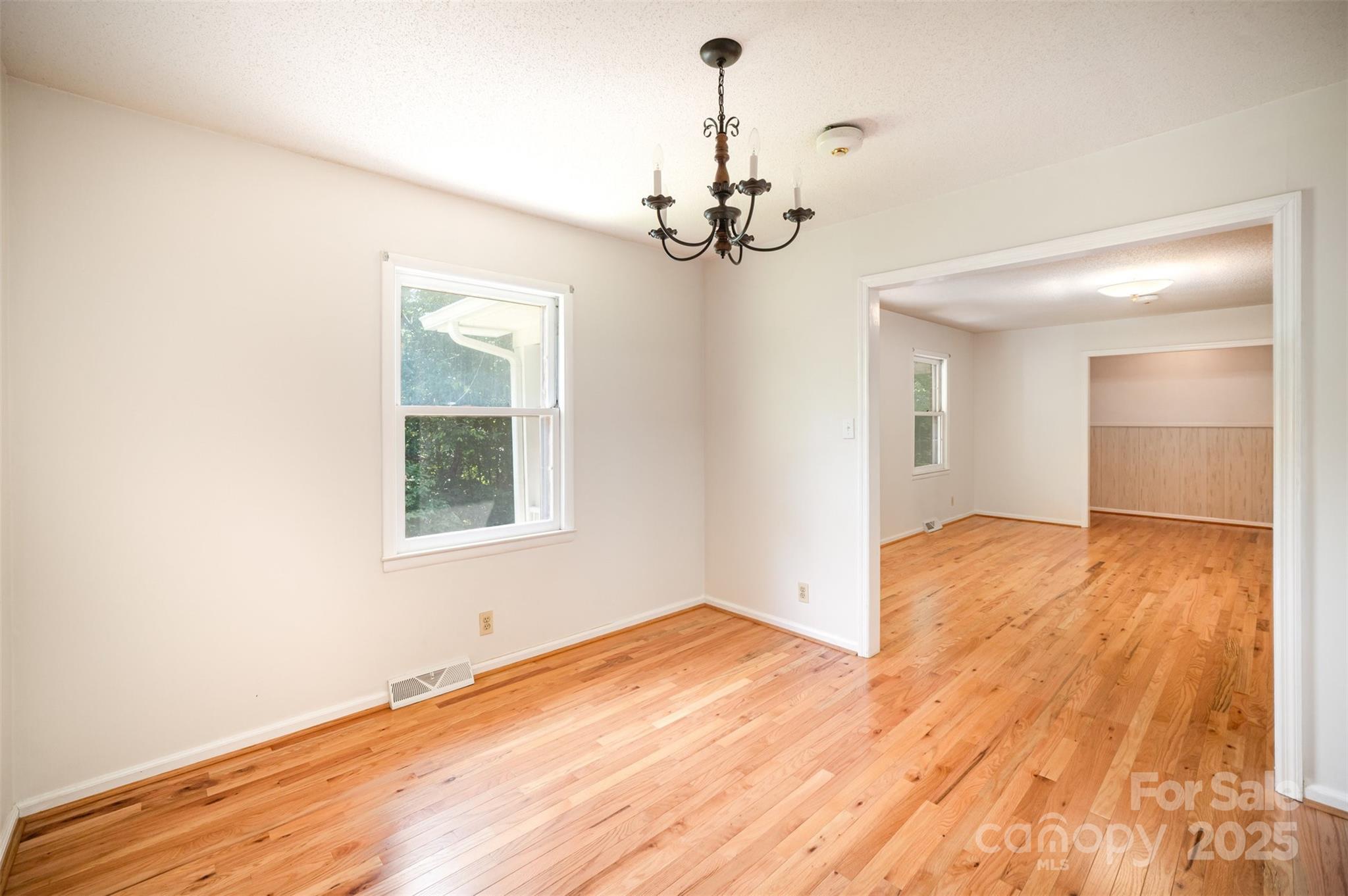 5474 Ussery Road Kershaw, SC 29067 - Photo 12 of 33 a view of empty room with wooden floor and window