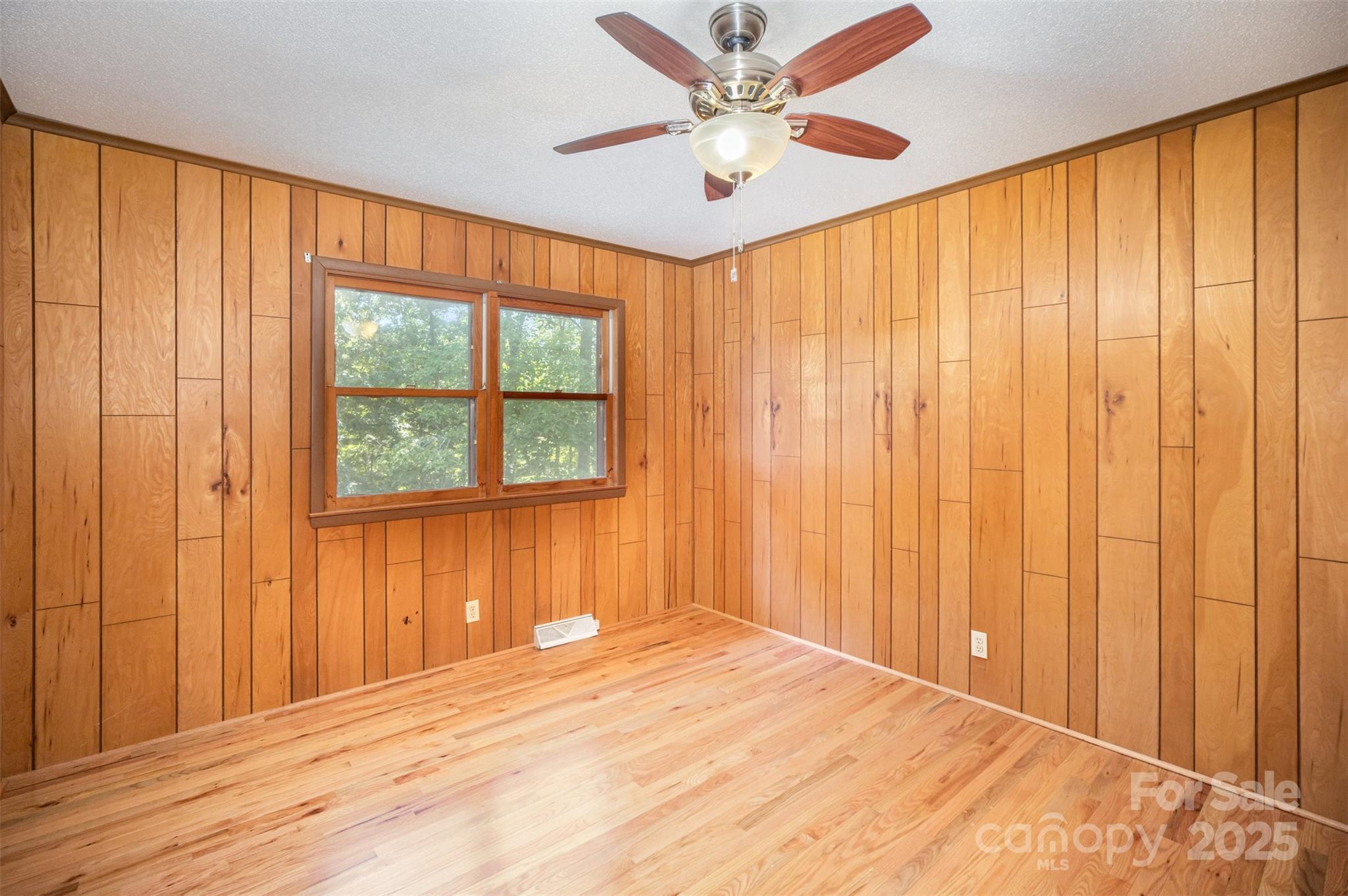 5474 Ussery Road Kershaw, SC 29067 - Photo 15 of 33 wooden floor in an empty room with a window